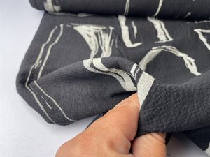 Vasket og crepet bomuld - flot abstrakt på sort bund